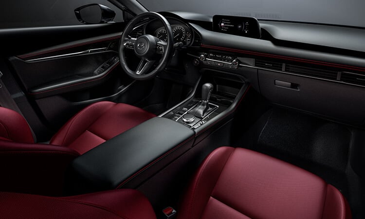 Comfortable front seating in the Mazda3 sedan.