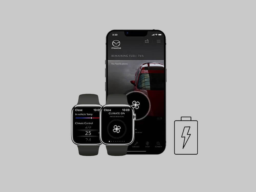 Two smartwatch screens and a smartphone display remote climate controls next to an icon of a battery with a lightning bolt.