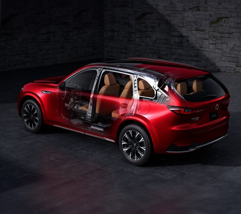 Exterior view of partially transparent CX-90 MEHV reveals interior and design details.  