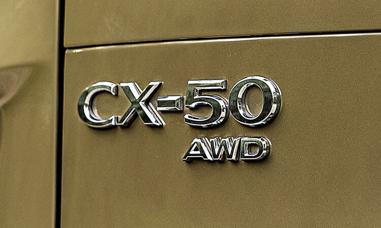 Close up of CX-50 AWD nameplate. 
