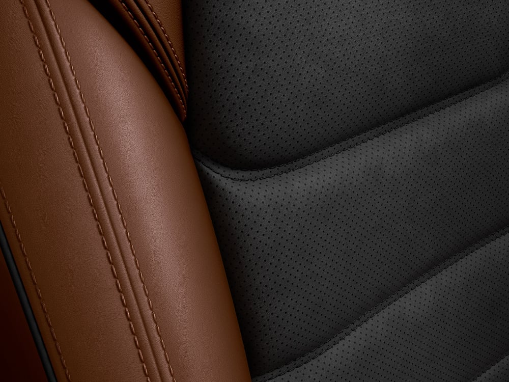 Close up of Terracotta/Black Leather seating textures.