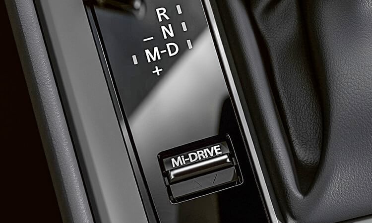 Close up of Mi-Drive toggle, shifter, multifunction HMI Commander control dial on CX-50 centre console. 