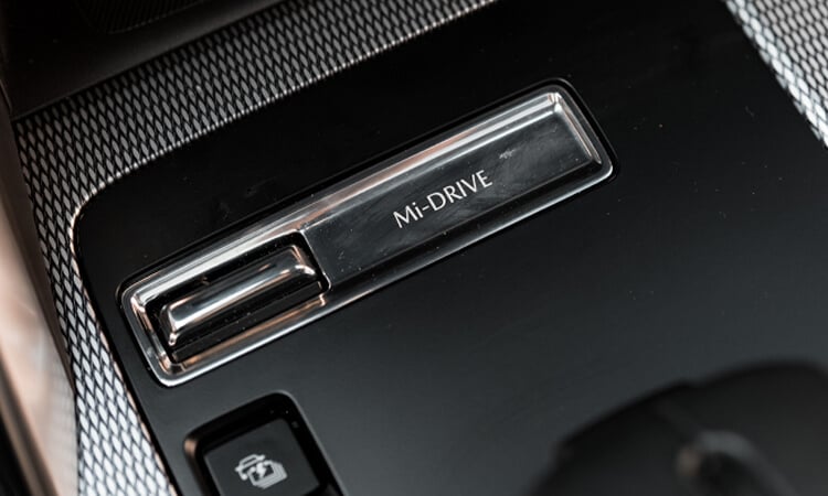 Closeup of Mi-Drive switch on console.  