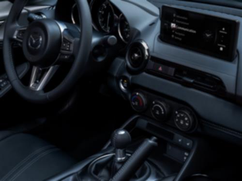 Close-up of the MX-5 ST cabin interior with black leather detail.